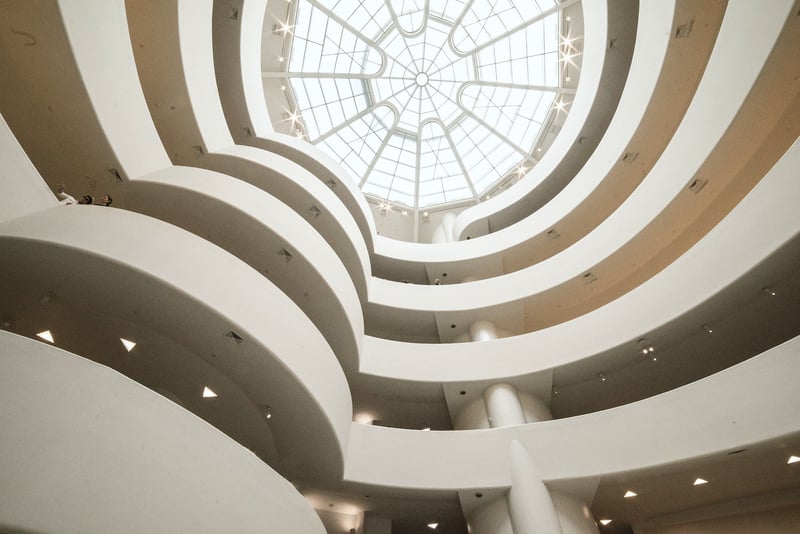 Interior spiral leading up to the domed skylight of the Guggenheim Museum in New York City, an modern architectural wonder
