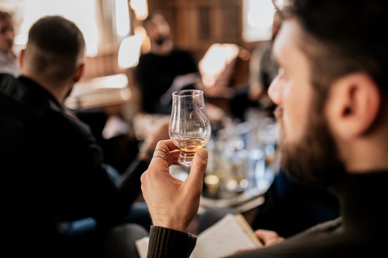 A man whisky tasting on a Strathisla distillery tour