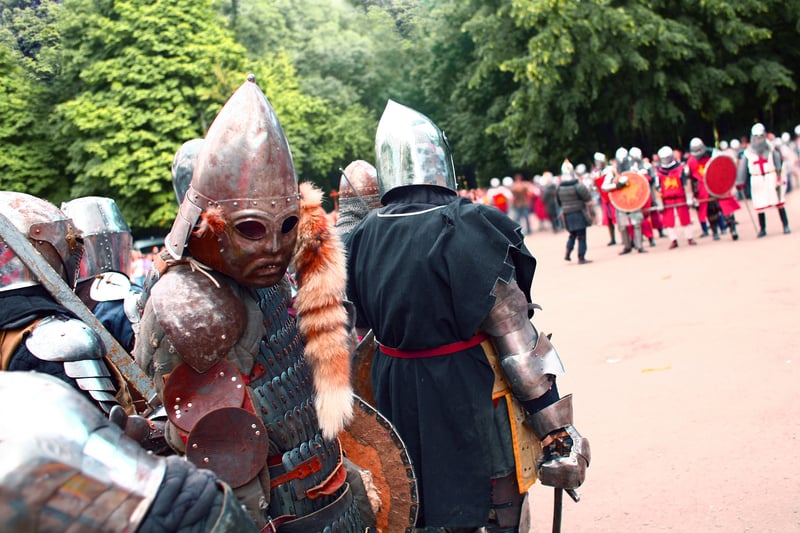 Knights before a fight, preparation to knight s tournament as part of a living history museum