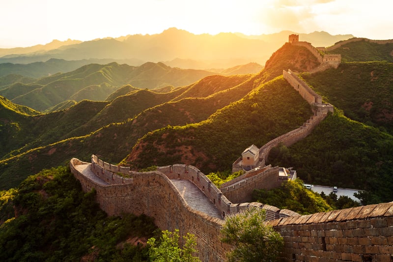 Another one of the most scenic places to go for a walk is the Great Wall of China during sunrise.