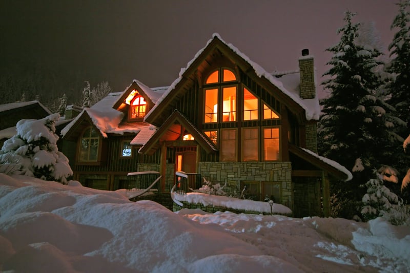 A winter home in Whistler, BC blanketed by a fresh dumping of snow. Slightly grainy, but warm.