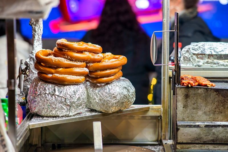 Pretzels in a street food shop at night - New York City, home of some of the best street dishes