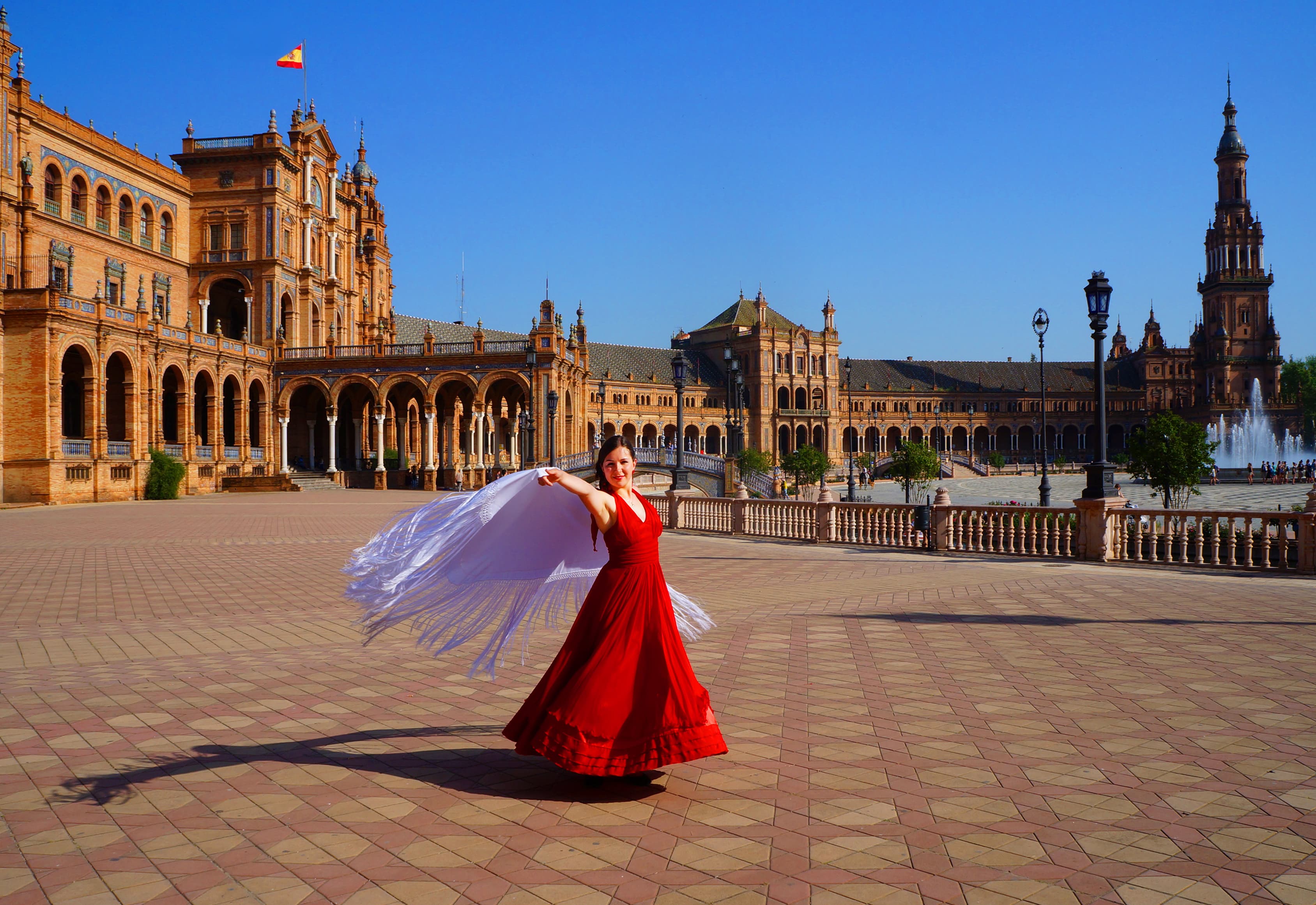 Female flamenco dancer in a square in Seville, Spain