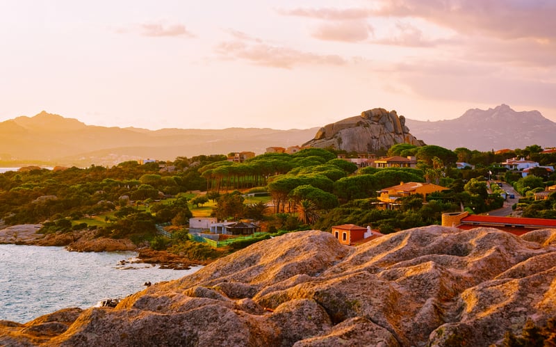 Visiting Europe: Sardinian rocky coastline with villas with beautiful manicured gardens