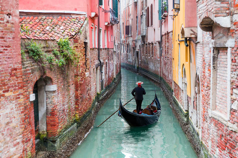 Canoe in Venice Italy canal
